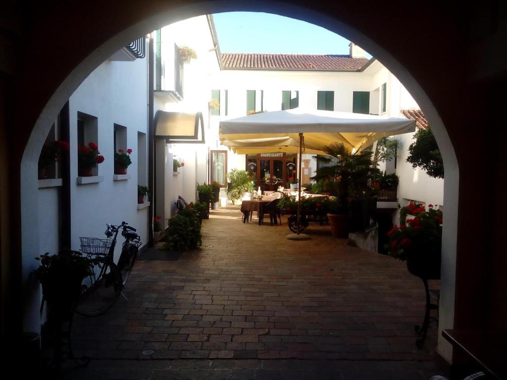 En restaurang eller annat matställe på Albergo Alla Speranza