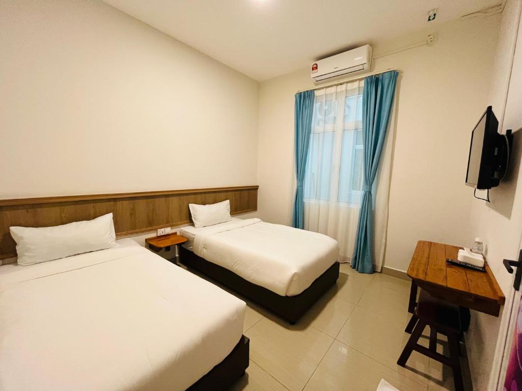 Alexis KT Roomstay - Habitación Gemela Estándar