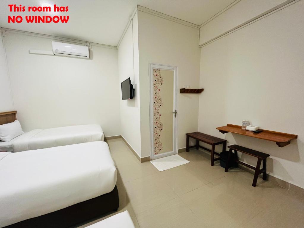 Alexis KT Roomstay - Habitación Triple Económica