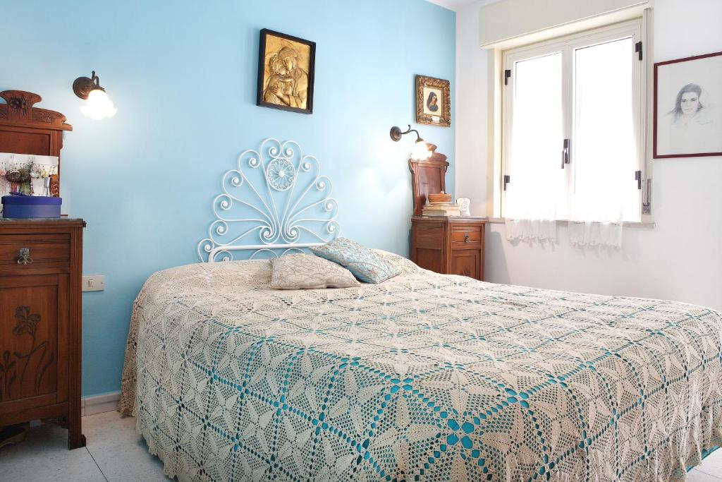 Posteľ alebo postele v izbe v ubytovaní Splendida Casa A Taormina " Casa di Anna "