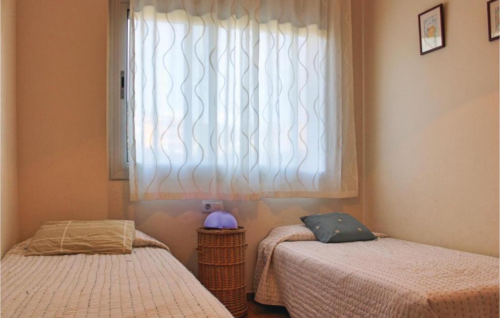 Postel nebo postele na pokoji v ubytování Stunning Apartment In Tossa De Mar
