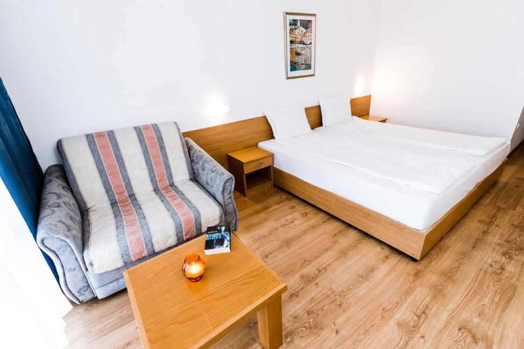 Postel nebo postele na pokoji v ubytování Hotel Opal - All Inclusive