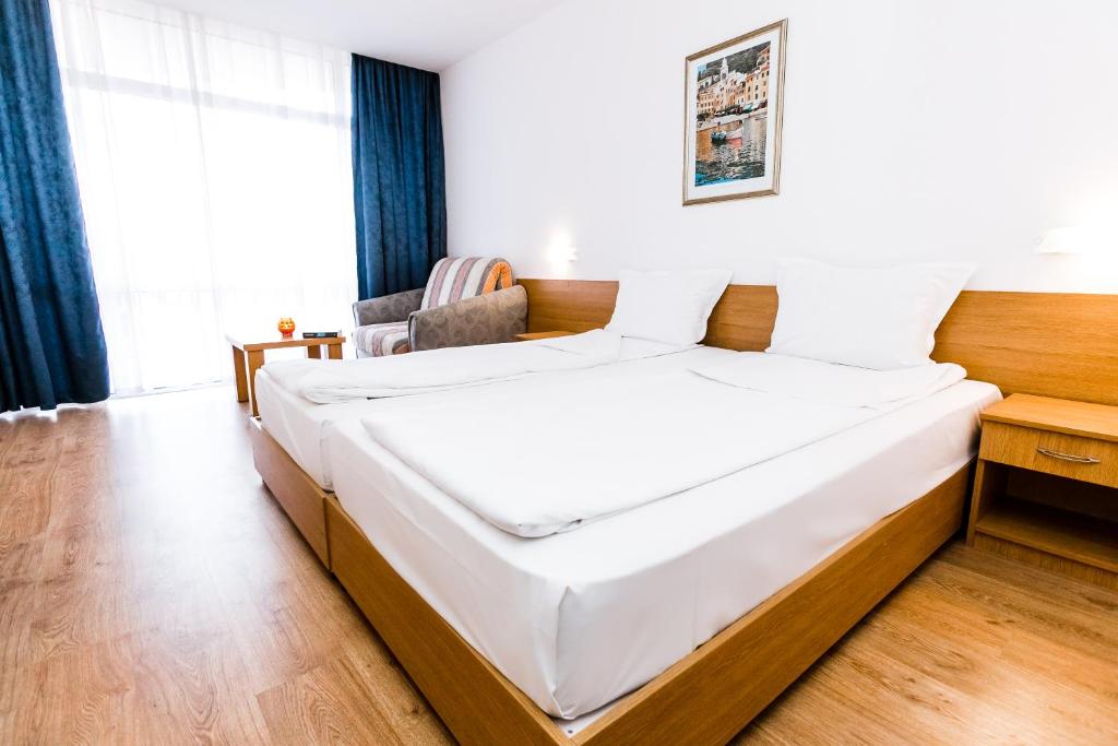 Postel nebo postele na pokoji v ubytování Hotel Opal - All Inclusive