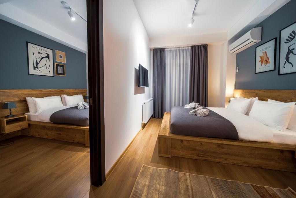 Postel nebo postele na pokoji v ubytování Reed Hotel Tbilisi