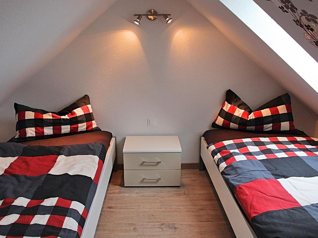Postel nebo postele na pokoji v ubytování Holiday Home Hasselfelde near Braunlage Ski Area