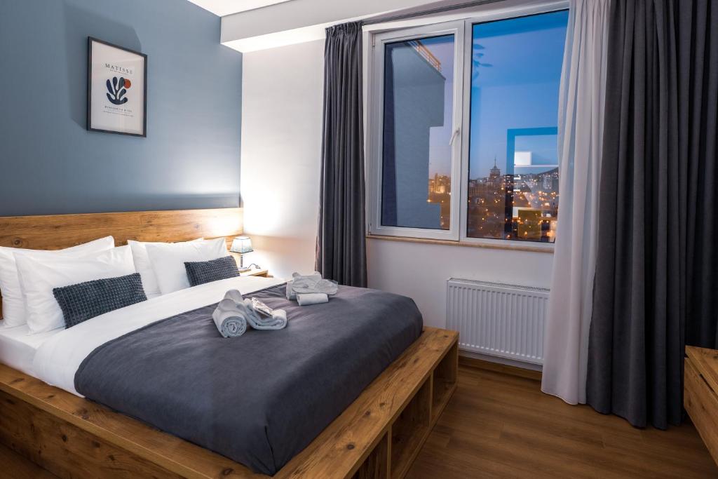 Postel nebo postele na pokoji v ubytování Reed Hotel Tbilisi