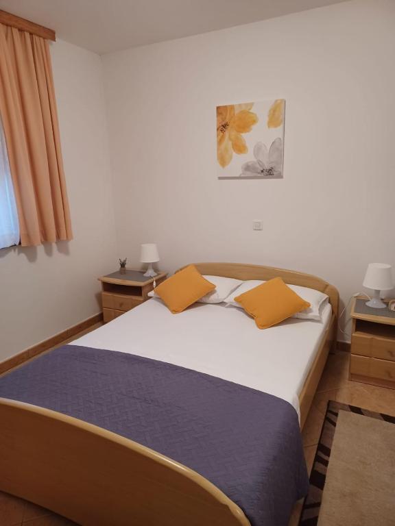 Letto o letti in una camera di LEDA