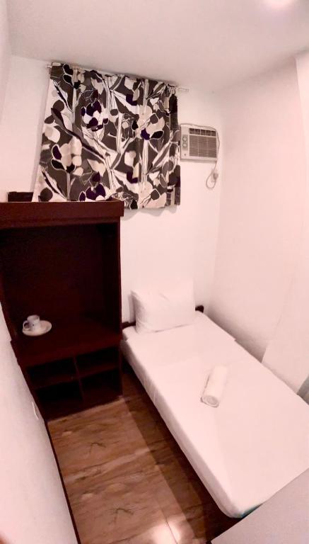 Postel nebo postele na pokoji v ubytování Kampotel Davao