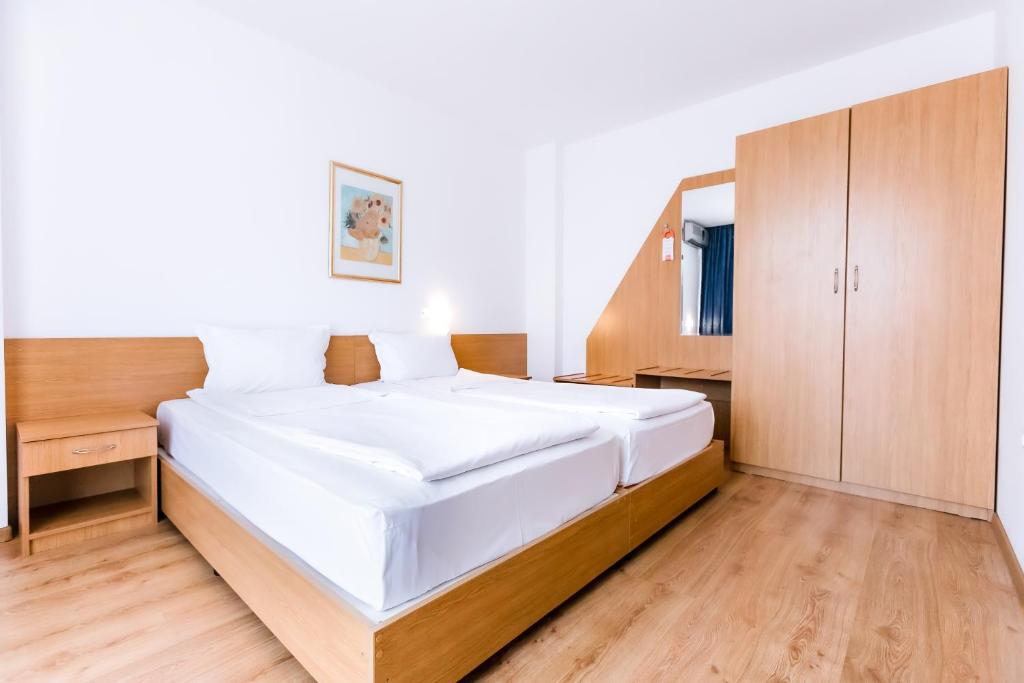 Postel nebo postele na pokoji v ubytování Hotel Opal - All Inclusive