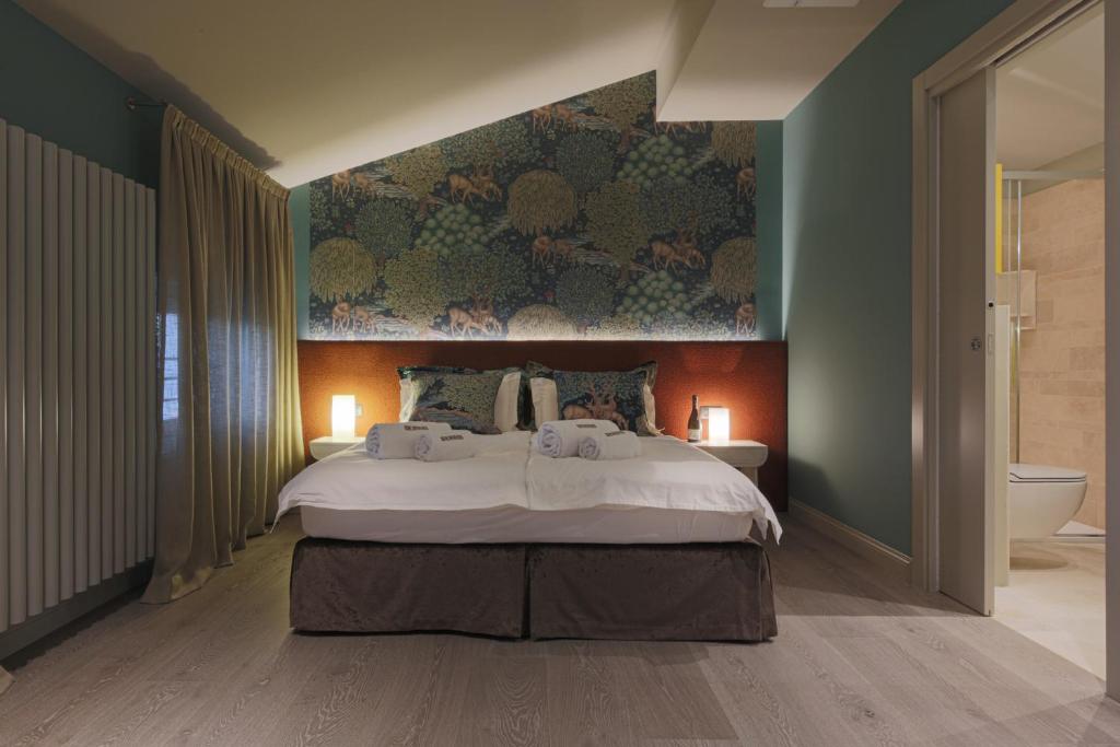 Posteľ alebo postele v izbe v ubytovaní B&B CASA OLTRAVAL