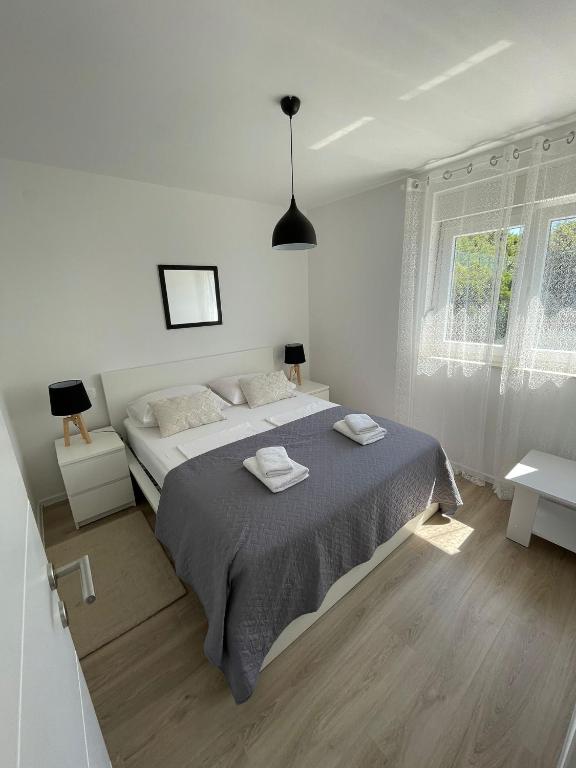 Postel nebo postele na pokoji v ubytování Vila Neda