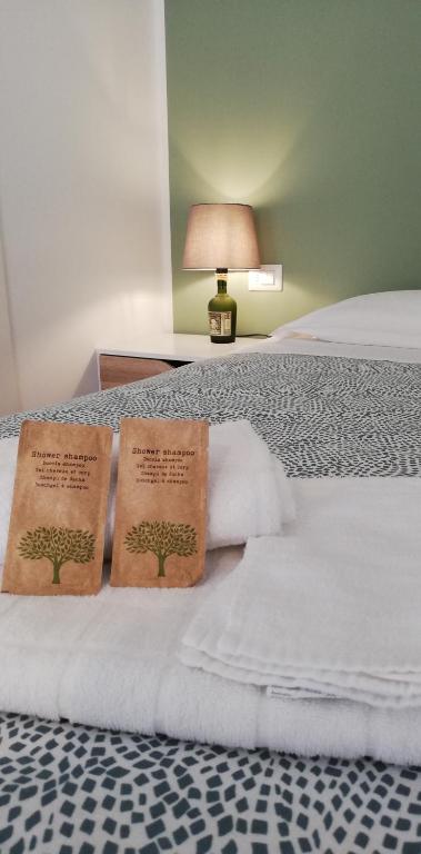 Posteľ alebo postele v izbe v ubytovaní AMARE MATERA comfortable rooms