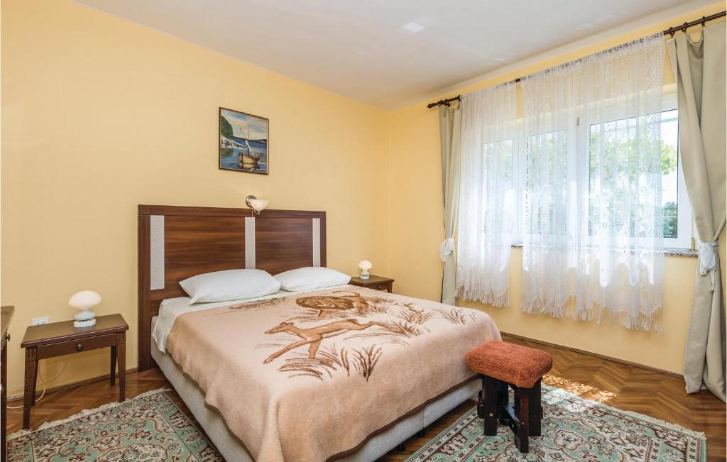 Posteľ alebo postele v izbe v ubytovaní 3 Bedroom Gorgeous Home In Kampor