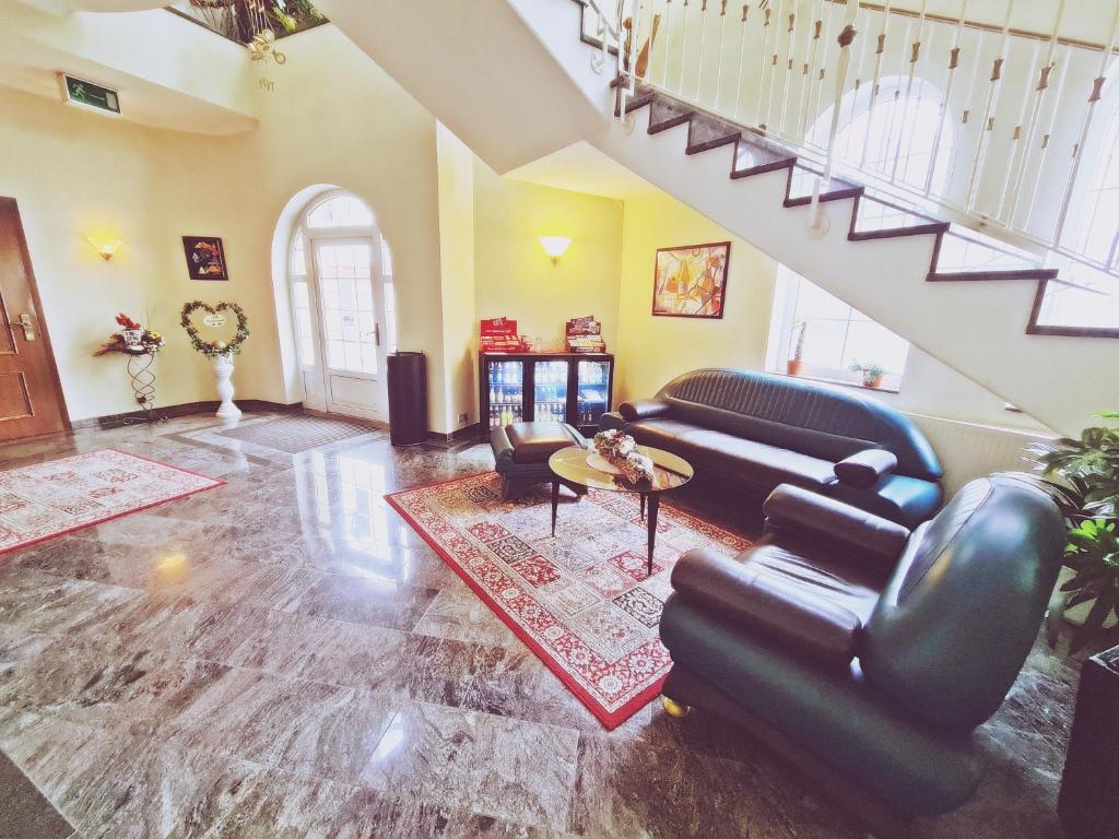 Posezení v ubytování DM Hotels & Apartments - Hotel Deutsches Haus