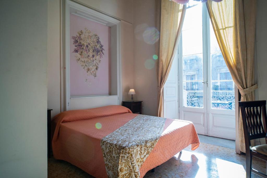 A bed or beds in a room at San Demetrio