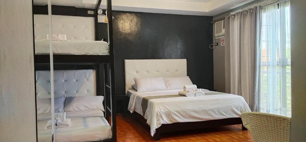 Postel nebo postele na pokoji v ubytování Rangya Hotel