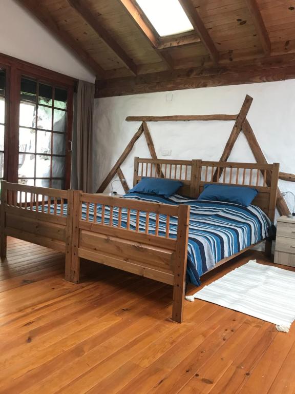 Cama o camas de una habitación en Finca Casa Madera 1