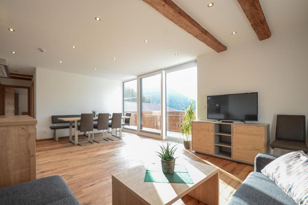 TV a/nebo společenská místnost v ubytování Gästehaus Sonne