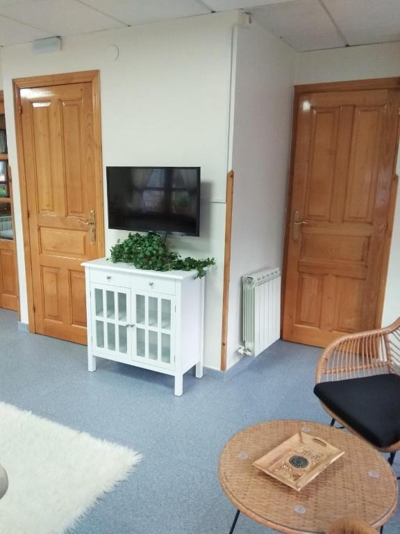 TV a/nebo společenská místnost v ubytování Apartamento Valle del Güeña