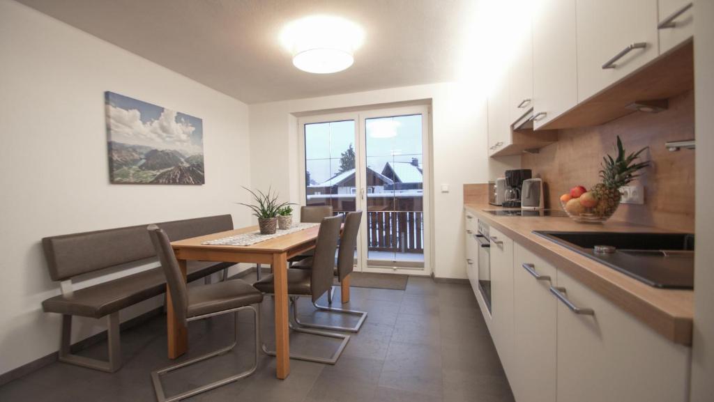 Kuchyň nebo kuchyňský kout v ubytování Gästehaus Sonne