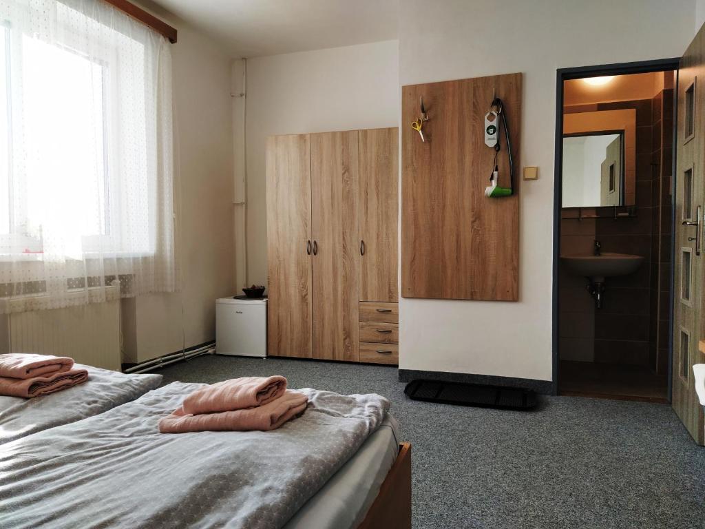 Postel nebo postele na pokoji v ubytování Prázdninový dům Na Panorámě