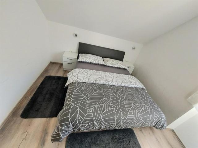 Posteľ alebo postele v izbe v ubytovaní Apartman Nelly
