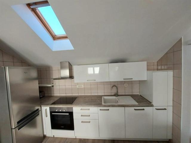 Kuchyňa alebo kuchynka v ubytovaní Apartman Nelly