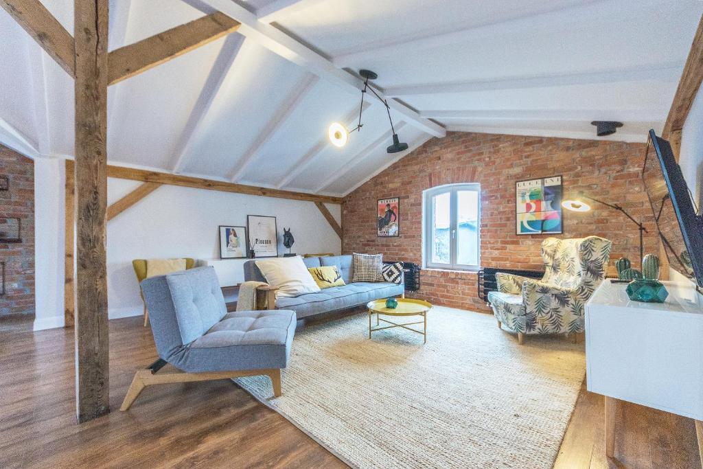 Et sittehjørne på Dom & House - Apartment Loft Supreme