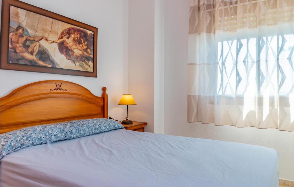 Posteľ alebo postele v izbe v ubytovaní Nice Apartment In Rincón De La Victoria