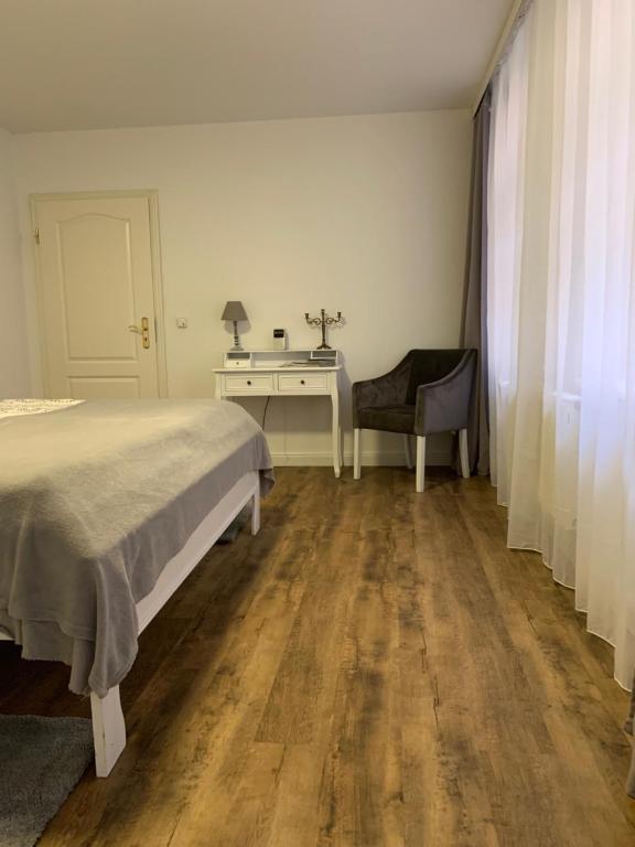 Postel nebo postele na pokoji v ubytování Ecke - der Romanik