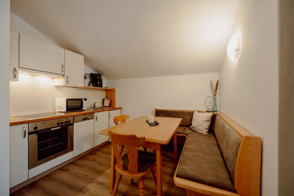 Kuchyň nebo kuchyňský kout v ubytování Stadlhof