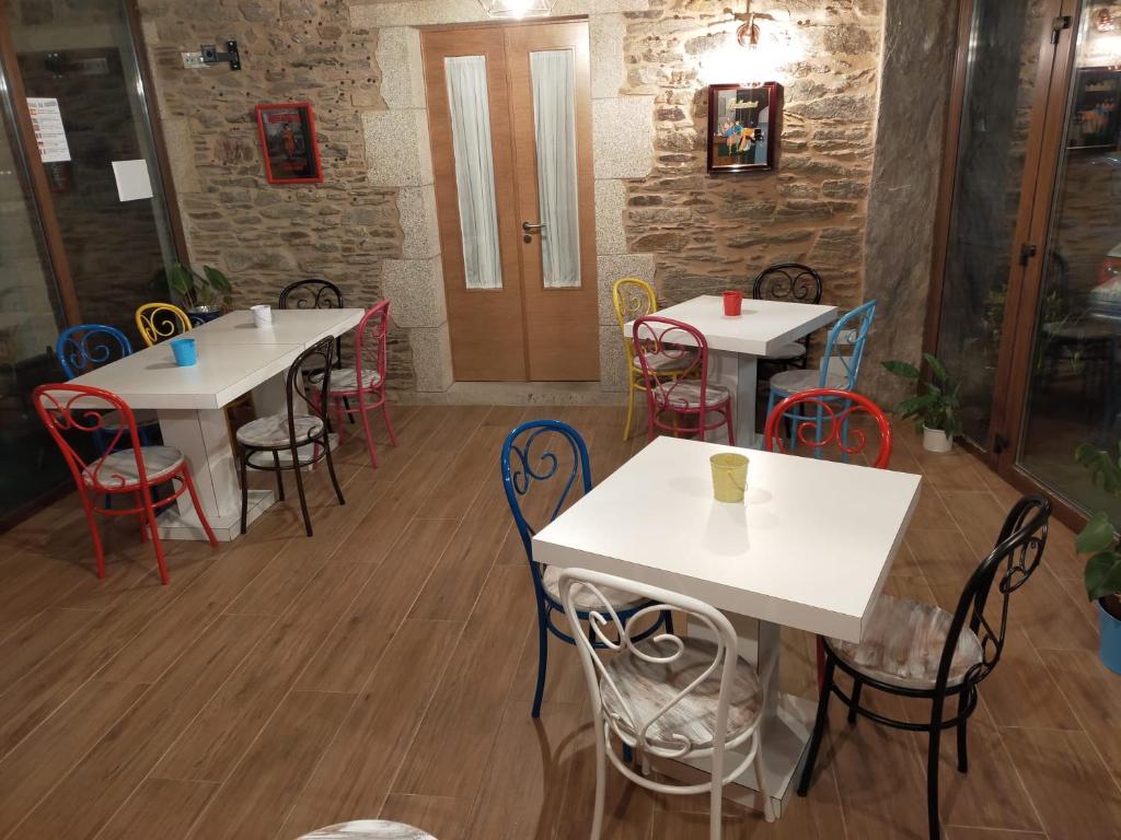 A restaurant or other place to eat at Casa do Horreo