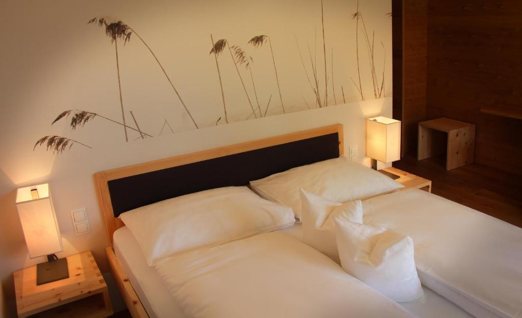 Postel nebo postele na pokoji v ubytování Steindl's Boutique Hotel