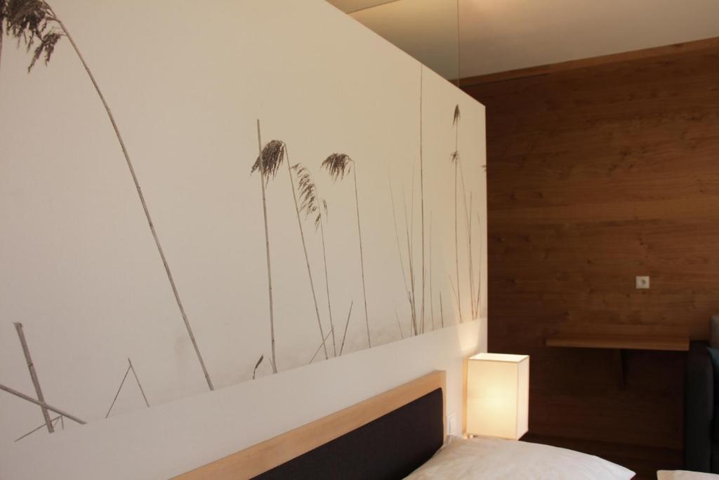 Postel nebo postele na pokoji v ubytování Steindl's Boutique Hotel