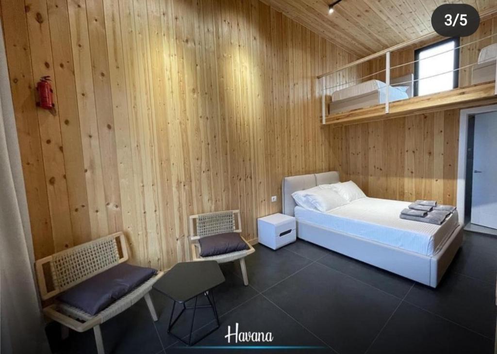 Postel nebo postele na pokoji v ubytování HAVANA HOUSE