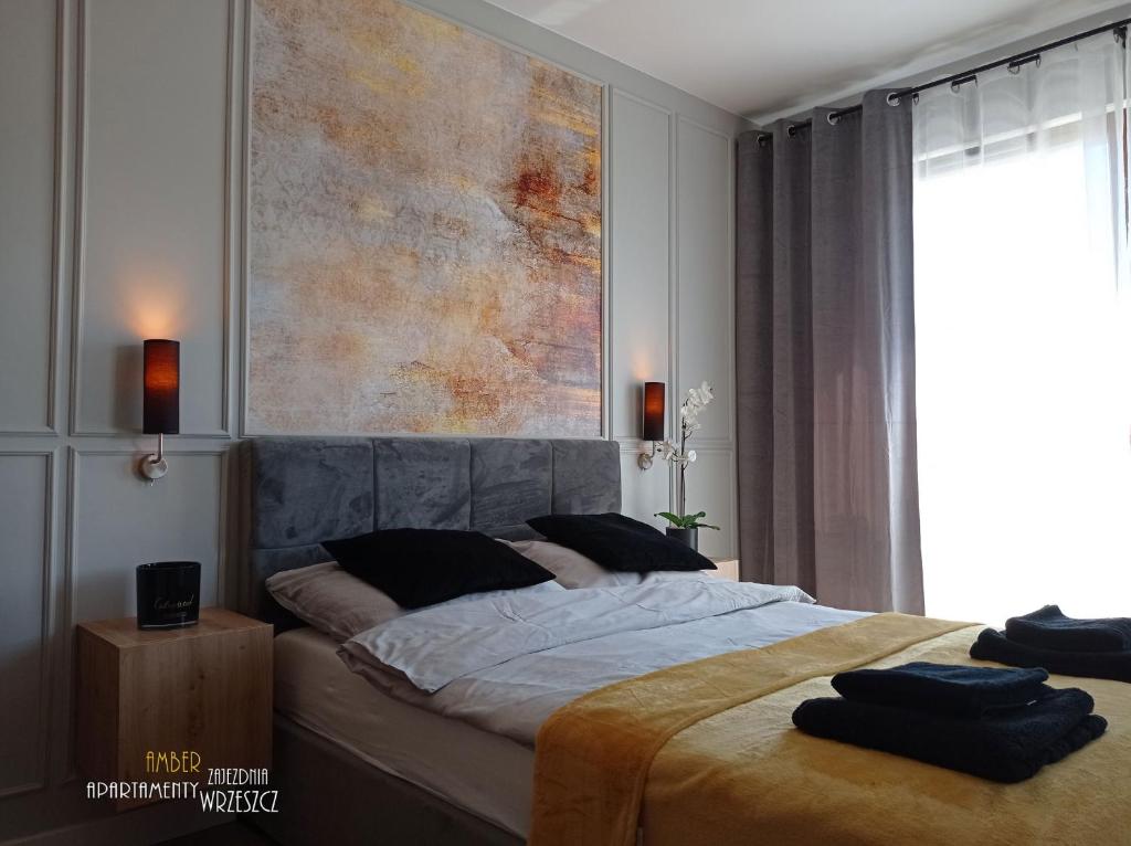Posteľ alebo postele v izbe v ubytovaní Apartament Amber - AZW Gdańsk