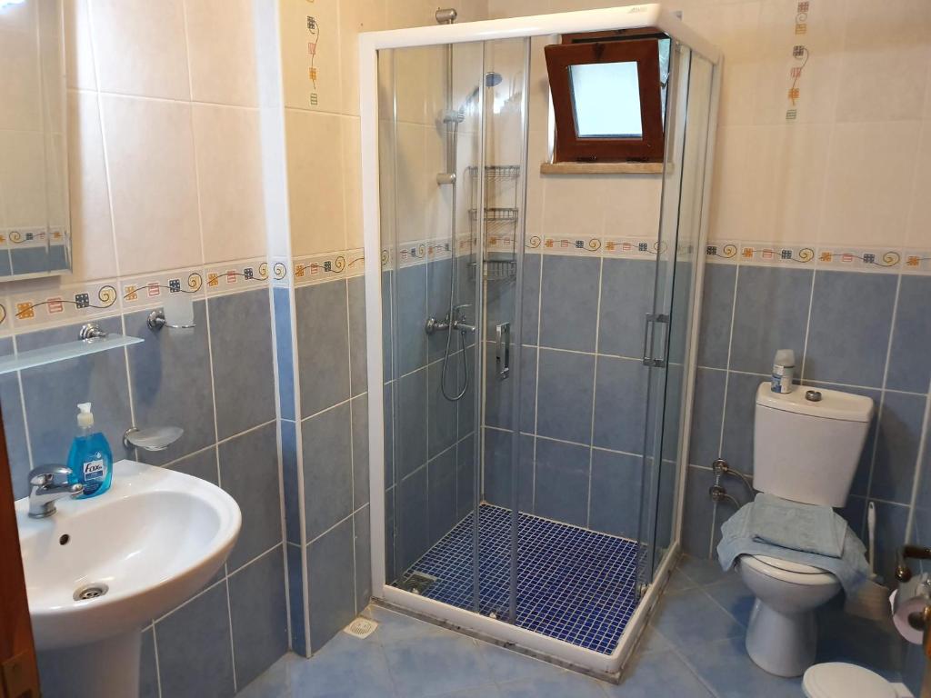Koupelna v ubytování Villa D'Louca