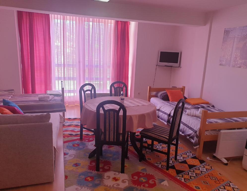 Postel nebo postele na pokoji v ubytování Apartments Kira
