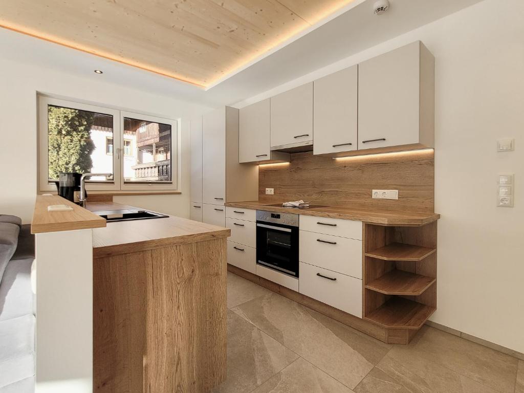Kuchyň nebo kuchyňský kout v ubytování Gästehaus Sonne