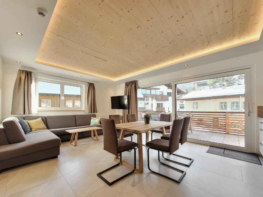 TV a/nebo společenská místnost v ubytování Gästehaus Sonne