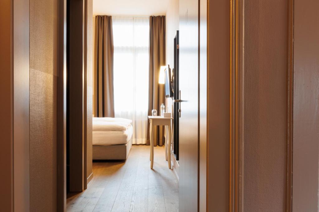 Letto o letti in una camera di Hotel Emmental