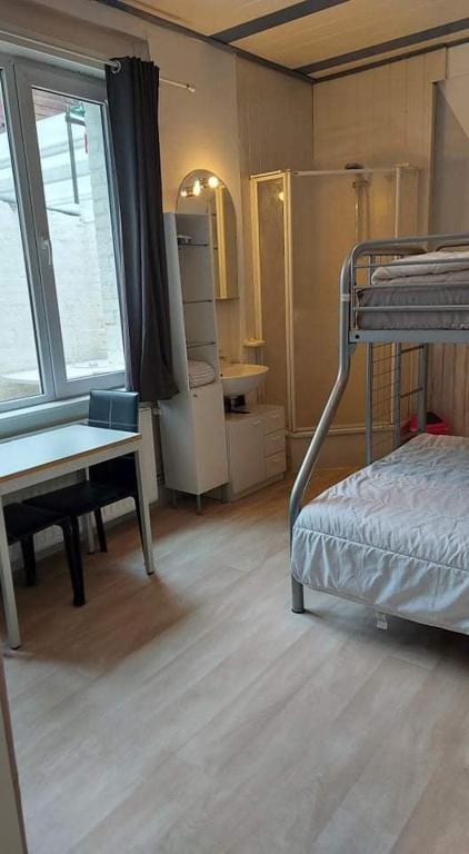 Postel nebo postele na pokoji v ubytování Le Rusticka