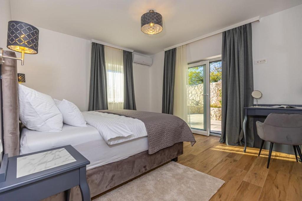 Posteľ alebo postele v izbe v ubytovaní Villa 21 Crikvenica Riviera