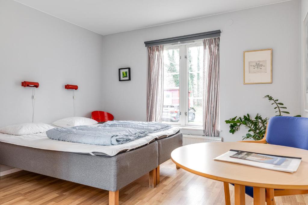 Postel nebo postele na pokoji v ubytování STF Baskemölla Hostel