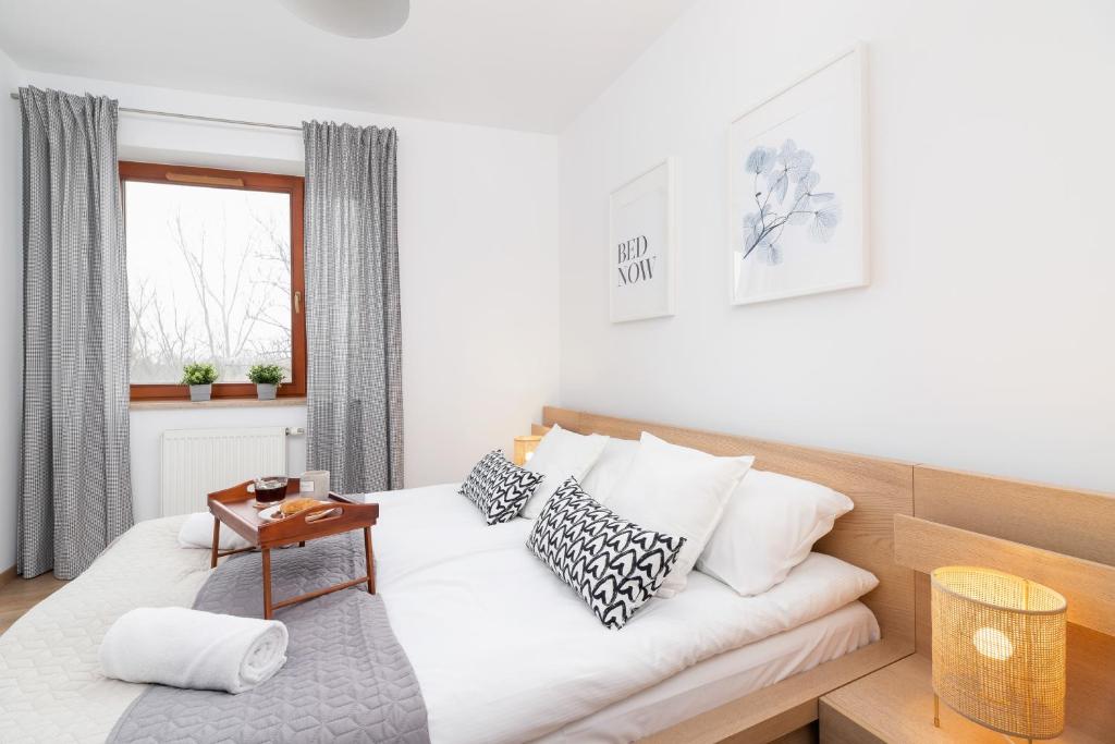 Posteľ alebo postele v izbe v ubytovaní Dzielnica XIII Podgórze Kraków by Noclegi Renters