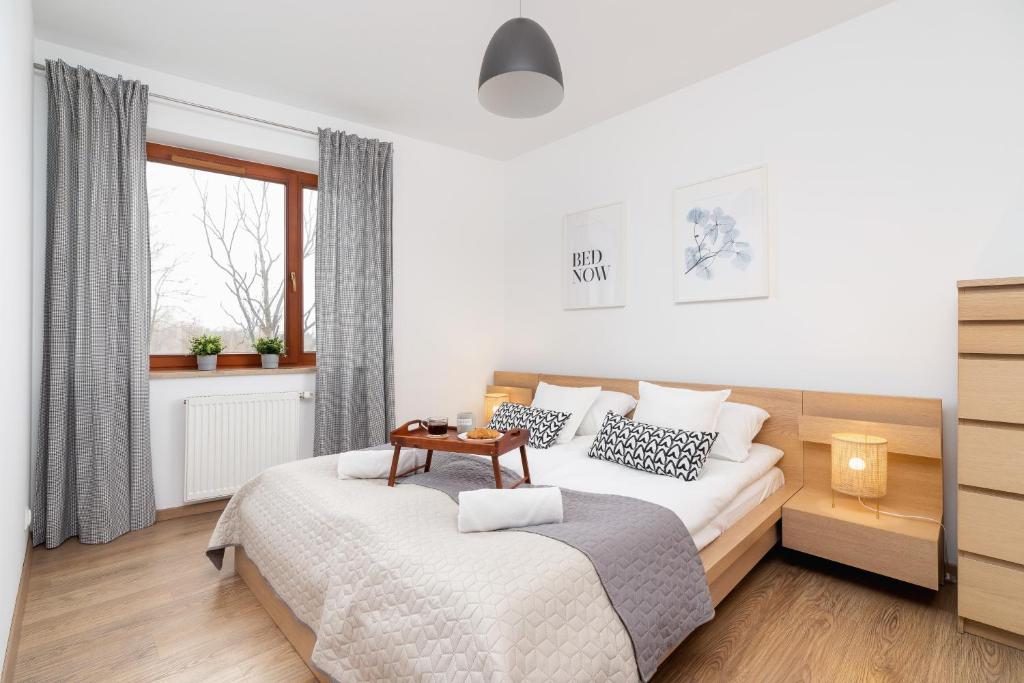 Posteľ alebo postele v izbe v ubytovaní Dzielnica XIII Podgórze Kraków by Noclegi Renters