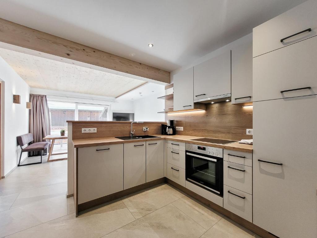 Kuchyň nebo kuchyňský kout v ubytování Gästehaus Sonne