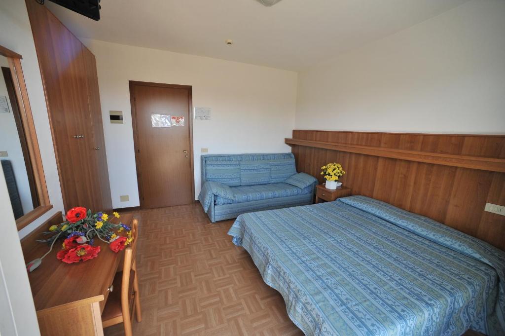 Postel nebo postele na pokoji v ubytování Hotel Aspe