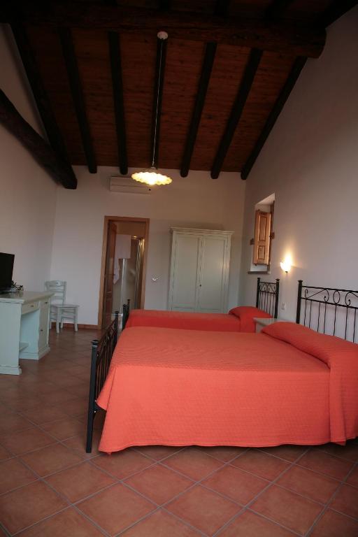 Postel nebo postele na pokoji v ubytování Agriturismo Galea