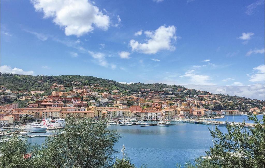 a view of a harbor with boats in the water at Villa Arduino in Santa Liberata